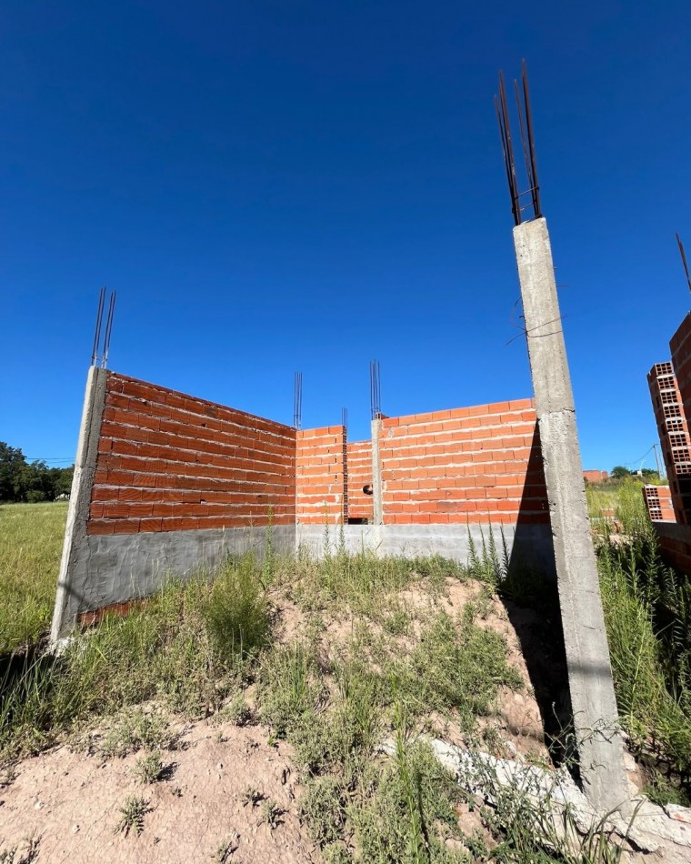 Terreno con construccion a terminar