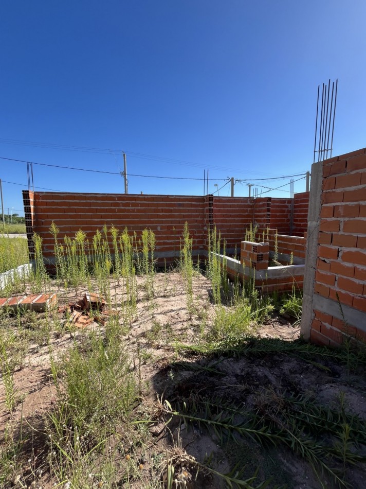 Terreno con construccion a terminar