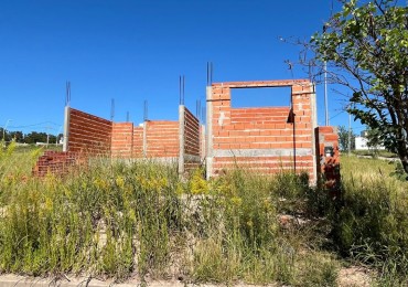 Terreno con construccion a terminar